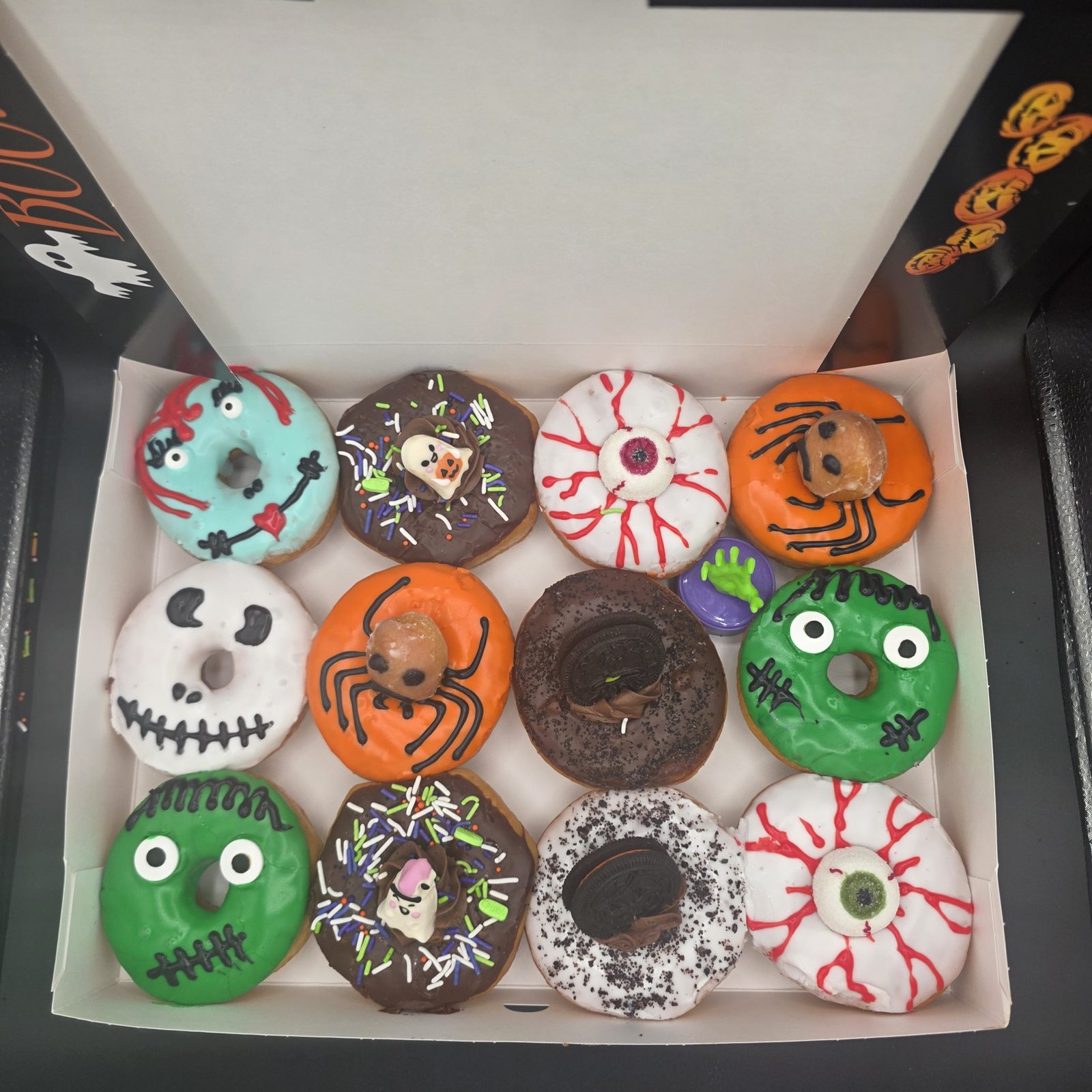 Boxed dozen of Halloween donuts